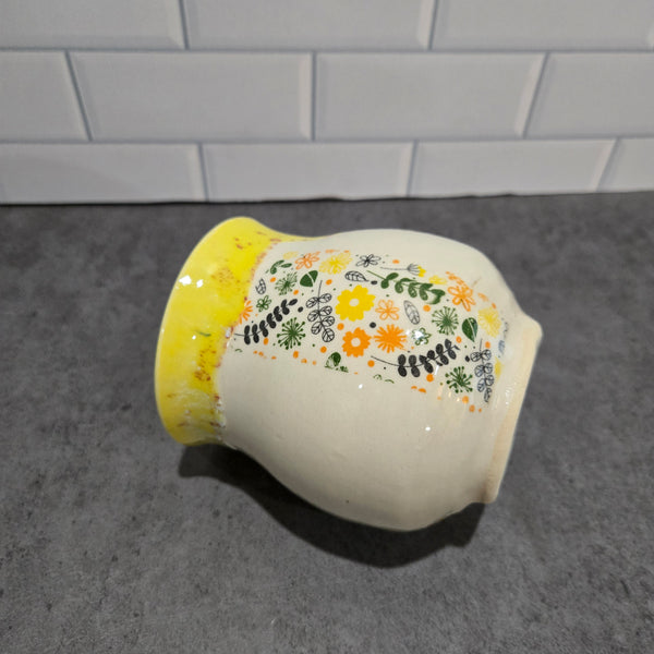 Yellow garden flower cup