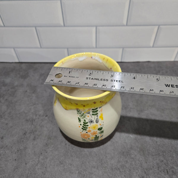Yellow garden flower cup